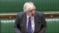 British Prime Minister Boris Johnson takes questions in parliament in London