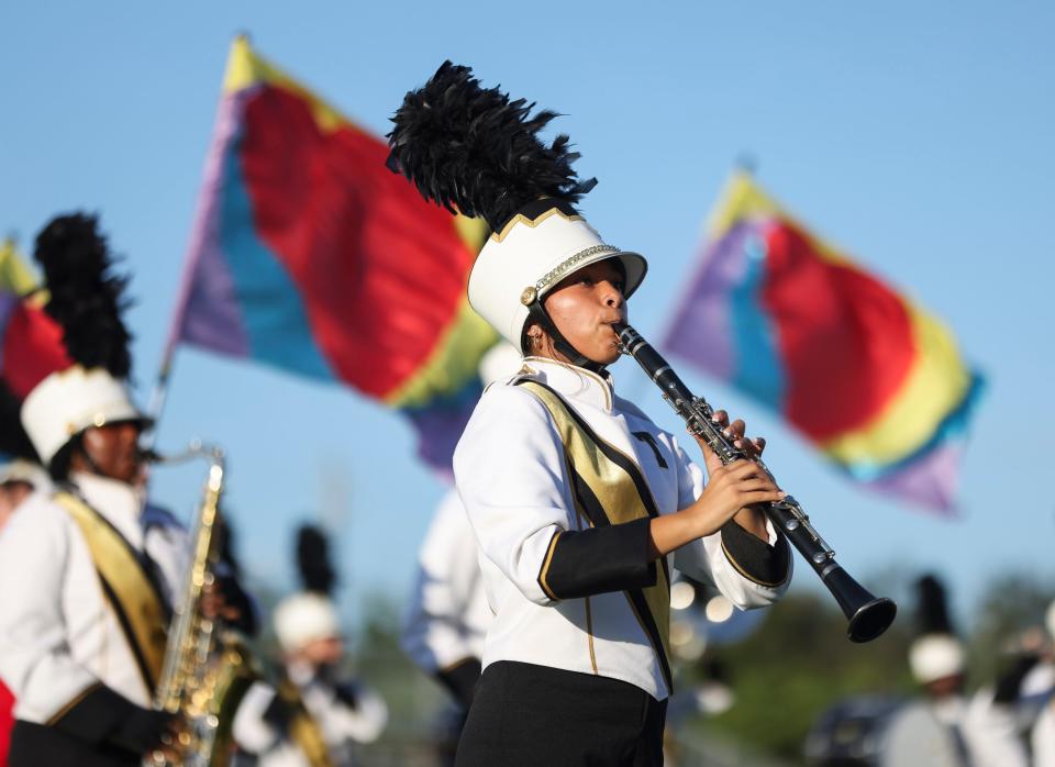 Treasure Coast High School marching band and color guard compete in the 42nd Annual Crown Jewel Marching Band Competition on Saturday, Oct. 14, 2023, at Vero Beach High School.