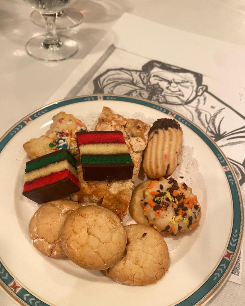 A plate of Italian American cookies in the dining room of Tiro a Segno.