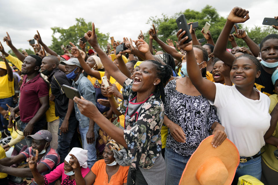 FILE - Supporters of Zimbabwean main opposition leader Nelson Chamisa greet him upon his arrival at a rally in Harare, Sunday, Feb. 20,2022. Chamisa has attracted considerable attention and followers. In response, police in Harare and other cities have been banning the party's meetings, as well as gatherings of civic organizations and church groups perceived as critical of the government. (AP Photo/Tsvangirayi Mukwazhi, File)