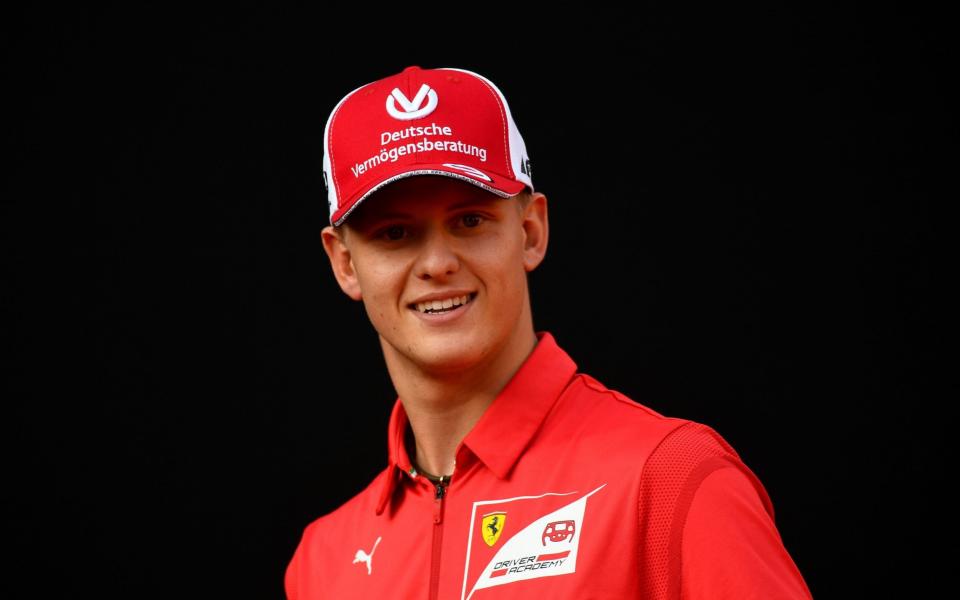  Racing driver Mick Schumacher attends an event to celebrate 90 years of Italian premium sports car maker Ferrari racing team - REUTERS