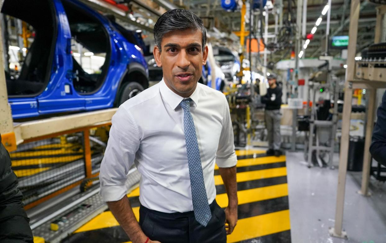 Rishi Sunak, the Prime Minister, is pictured this morning during a visit to a Nissan factory in Sunderland