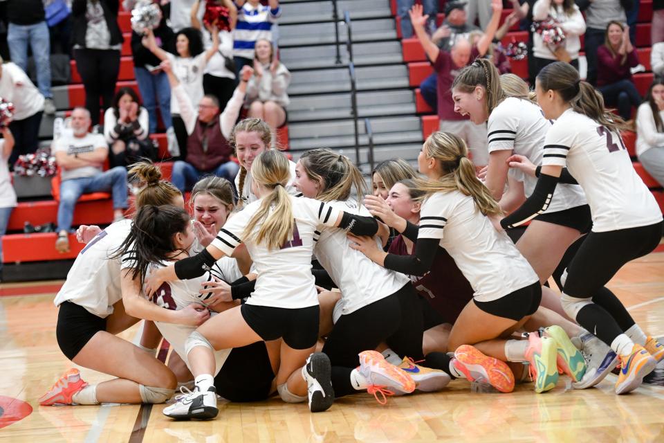 The Beaver Bobcats celebrate their 3-2 win over Freeport winning the Class 2A WPIAL volleyball championship Saturday at Peters Township High School.