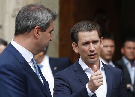 Austria's Chancellor Sebastian Kurz and Bavaria's Prime Minister Markus Soeder address the media before a joint cabinet meeting in Linz, Austria, June 20, 2018. REUTERS/Leonhard Foeger