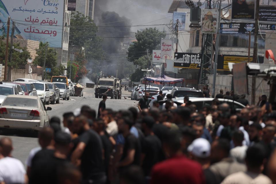 Palestinians react back to Israeli forces who killed at least 9 and injured 50 Palestinians in Jenin, West Bank.