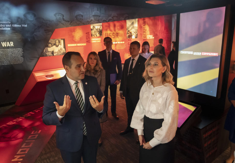 Ukraine’s first lady, Olena Zelenska, tours the Victims of Communism Museum with Andrew Bremberg, President and CEO of the Victims of Communism Memorial Foundation before accepting the Dissident Human Rights Award on behalf of the people of Ukraine in Washington, Tuesday, July 19, 2022. (AP Photo/Carolyn Kaster)