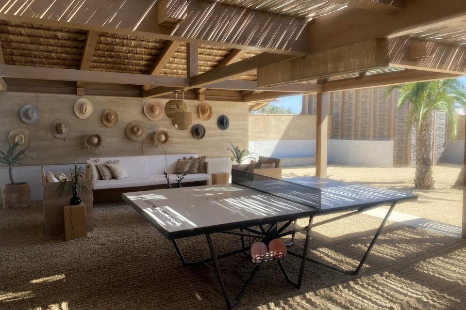 Table tennis and lobby decorated with sombreros