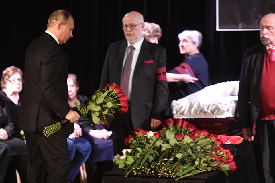 Russian President Vladimir Putin, left, pays his last respects to Lyudmila Alexeyeva, the Moscow Helsinki Group Chair and human rights activist during a farewell ceremony in Moscow, Russia, Tuesday, Dec. 11, 2018. A Russian rights official says Lyudmila Alexeyeva, who was forced into exile by Soviet authorities after founding Russia's oldest human rights organization in 1976, has died in a Moscow hospital at 91 it was reported on Saturday, Dec. 8, 2018. (Alexander Nemenov/Pool Photo via AP)