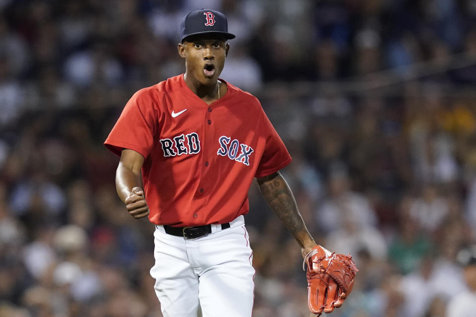 Boston Red Sox relief pitcher Phillips Valdez reacts after striking out New York Yankees' Ryan LaMarre to end the top of the fourth inning of a baseball game at Fenway Park, Friday, July 23, 2021, in Boston. (AP Photo/Elise Amendola)