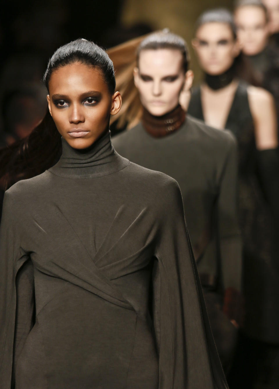 Fashion from the Fall 2013 collection of Donna Karan New York is modeled on Monday, Feb. 11, 2013 in New York. (AP Photo/Bebeto Matthews)