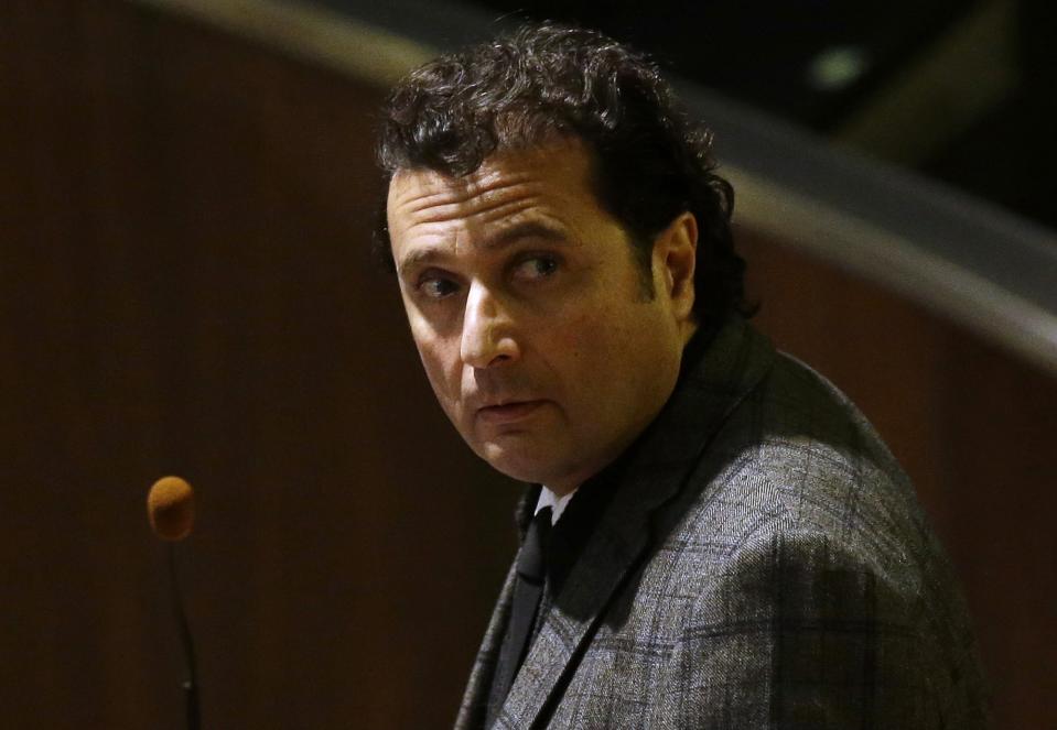 FILE - Francesco Schettino attends his trial at the Grosseto court, Italy, on Feb. 11, 2015. The captain of the capsized Costa Concordia, who left the sinking luxury liner when many passengers were still aboard, has been convicted of multiple charges of manslaughter and sentenced to 16 years in jail. The phrase "Women and children first" and all it implies about whom to save first in a disaster is rooted in the shipwrecks of centuries past and popularized by Hollywood's treatment of the Titanic disaster is getting another airing at a time when women are expected to do most everything men do. Experts say the unwritten law of the sea is a Hollywood-fed myth and a relic of Victorian-era chivalry. At the center of this round of questions is the prisoners-for-hostages deal between Israel and Hamas last month that prioritized releasing women and children after negotiators agreed that mothers and their children should not be separated. (AP Photo/Gregorio Borgia)