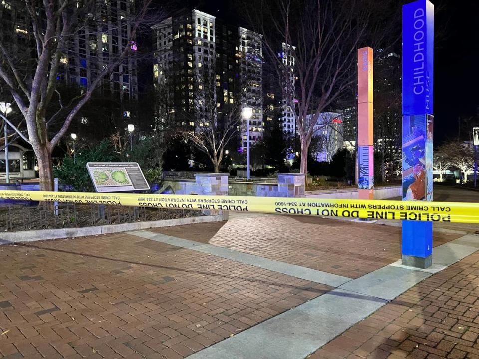 Crime scene tape stretches across Romare Bearden Park after a New Years Eve shooting injured several people. CMPD hasn’t provided the Observer records about crime at the park.