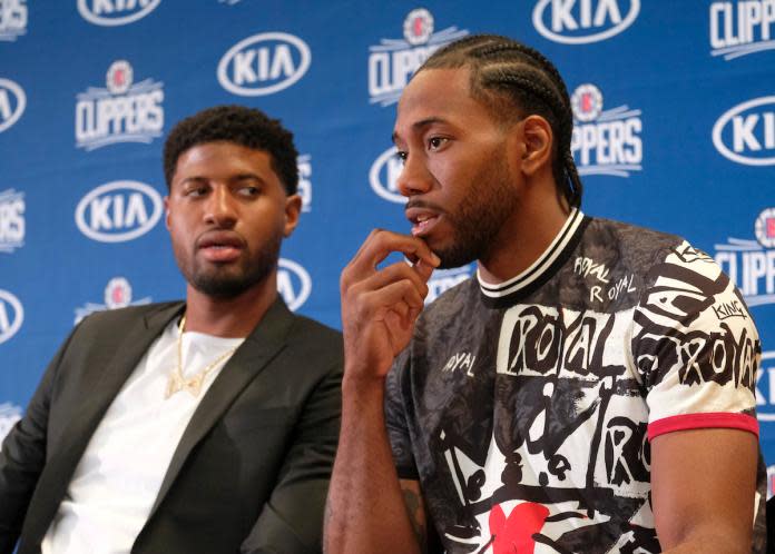 ▲快艇隊Paul George(左)與Kawhi Leonard(右)。（圖／美聯社／達志影像）