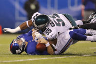 New York Giants quarterback Daniel Jones (8) is sacked by Philadelphia Eagles defensive end Brandon Graham (55) in the first half of an NFL football game, Sunday, Dec. 29, 2019, in East Rutherford, N.J. (AP Photo/Adam Hunger)