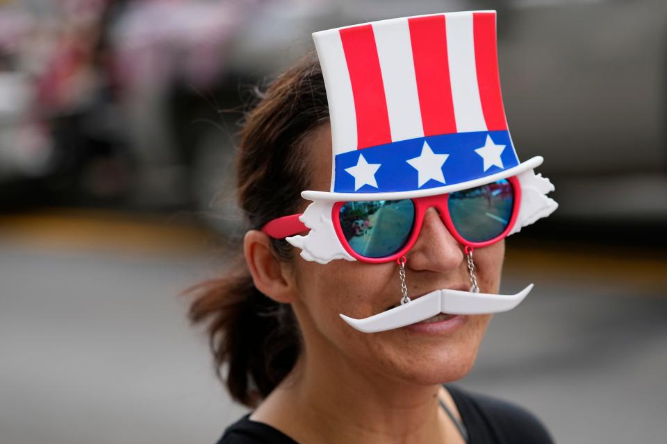 A parade participant shows off her Independence Day regalia at last year's Red, White & Boom! celebration.