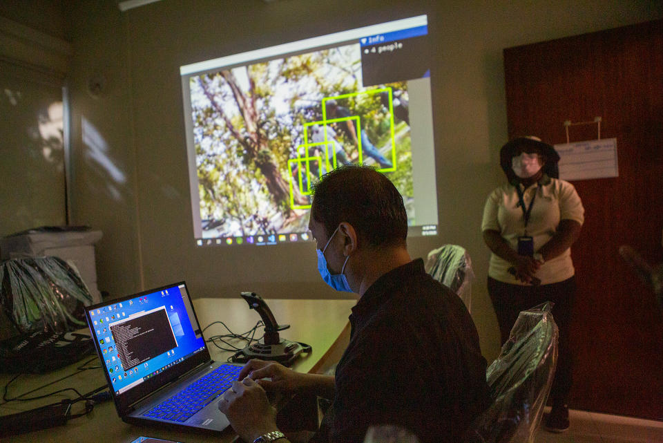 A demonstration being given to show how the SPOT robot can be remotely piloted. (PHOTO: Dhany Osman / Yahoo News Singapore)