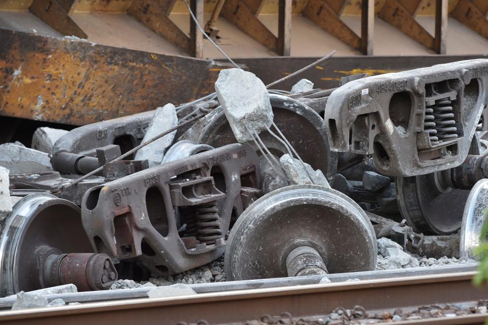 A Florida East Coast Railway freight train derailed at the east end of Northeast Clarissa Street on Thursday, May 19, 2022, in Jensen Beach. Five train cars toppled and three more came off the tracks, said Martin County Fire Rescue District Chief Joshua Shell.