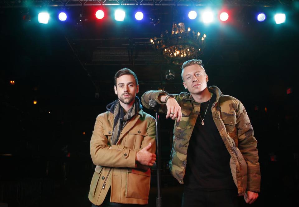 FILE - In this Nov. 20, 2012 file photo, American musician Ben Haggerty, better known by his stage name Macklemore, right, and his producer Ryan Lewis pose for a portrait at Irving Plaza in New York. Macklemore & Ryan Lewis feat. Wanz, "Thrift Shop" (Macklemore) is the number one top streamed track for the United States on Spotify from Monday, March 4, 2013 to Sunday, March 10 (Photo by Carlo Allegri/Invision/AP, File)