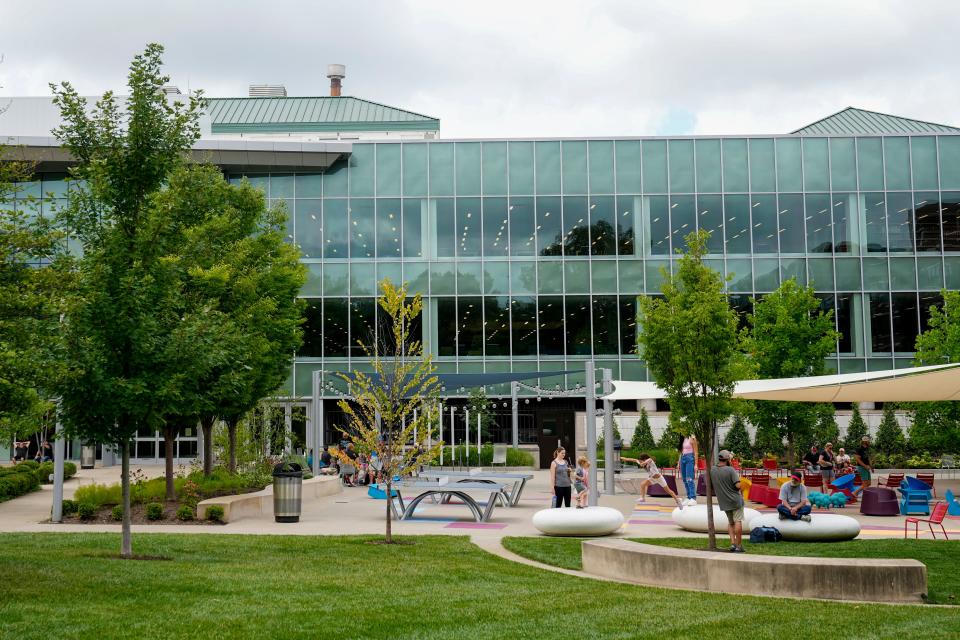 Visitors enjoy Kaufman Park outside the Columbus Metropolitan Library main branch Downtown. Voters overwhelmingly approved a 1.5 mill operating levy on Tuesday.