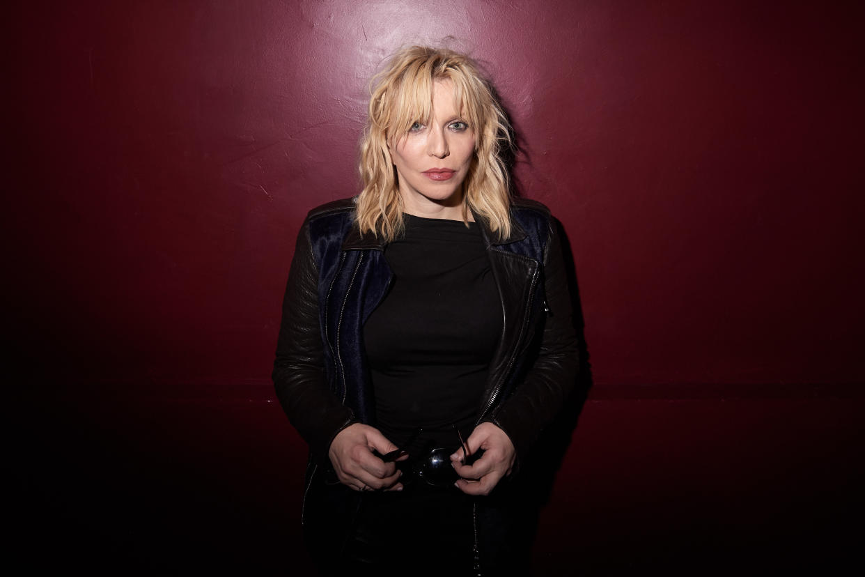 Courtney Love says the “universe always rips open on this day” — the anniversary of Kurt Cobain’s death. (Photo: Victor Boyko/Getty Images for Balmain at Paris Fashion Week 2018)