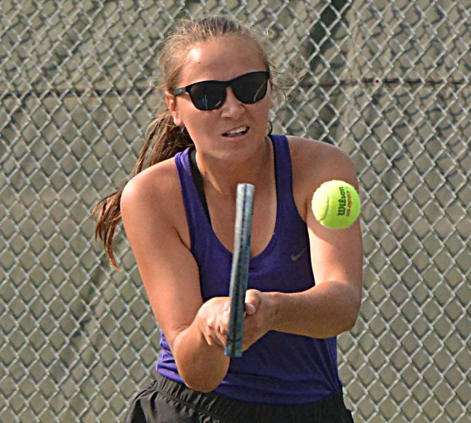 Leyla Meester of Watertown hits a backhand return during a high school girls tennis dual against Sioux Falls Lincoln on Tuesday, Aug. 29, 2023 at the Highland Park courts in Watertown.