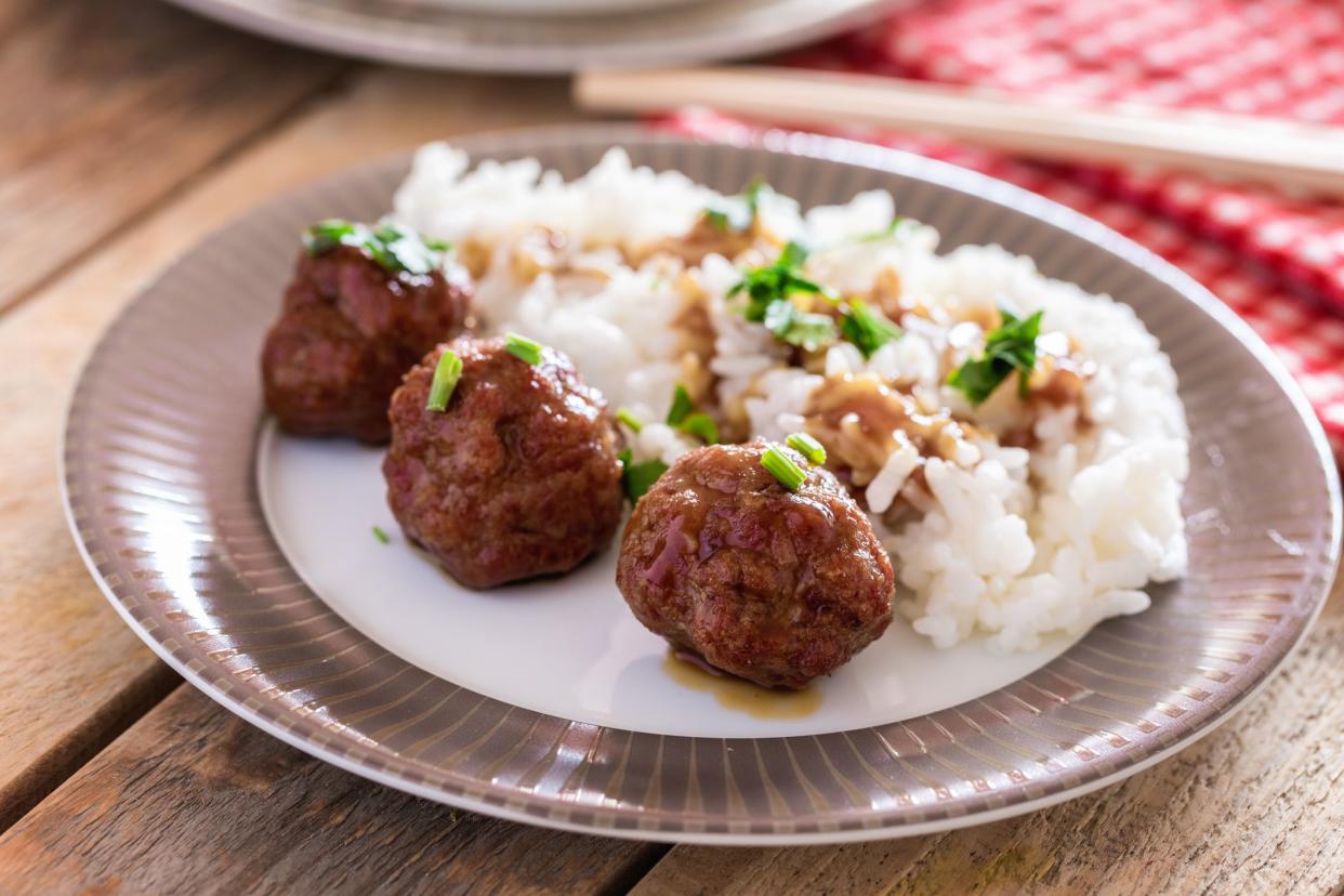 Thai cuisine, meatballs with rice, close-up