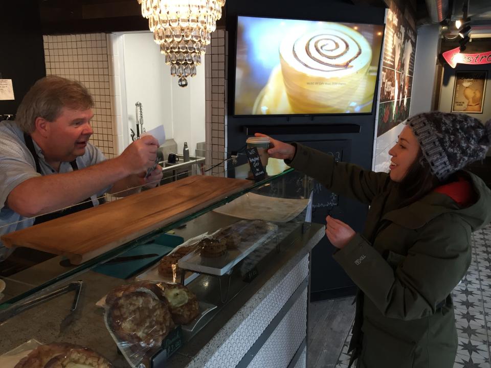 Perky Planet Coffee Shop owner Richard 
Vaughn waits on Kelsey Tierney of Monkton on Jan. 29, 2019.