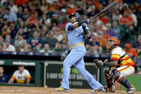 Aug 10, 2018; Houston, TX, USA; Seattle Mariners designated hitter Nelson Cruz (23) hits a RBI double agains the Houston Astros in the eighth inning at Minute Maid Park. Mandatory Credit: Thomas B. Shea-USA TODAY Sports