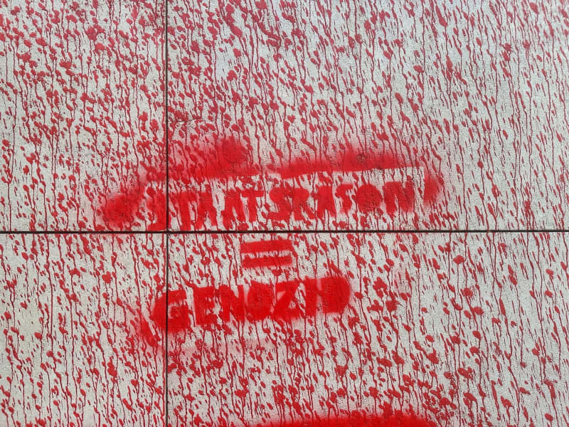 A view of the SPD party headquarters in Berlin sprayed with red paint. Paul Zinken/dpa