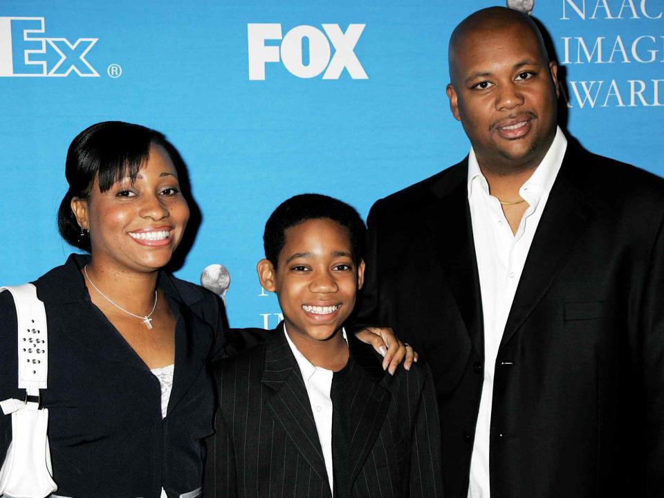 <p>David Livingston/Getty</p> Tyler James Williams with his parents at the 37th NAACP Image Awards