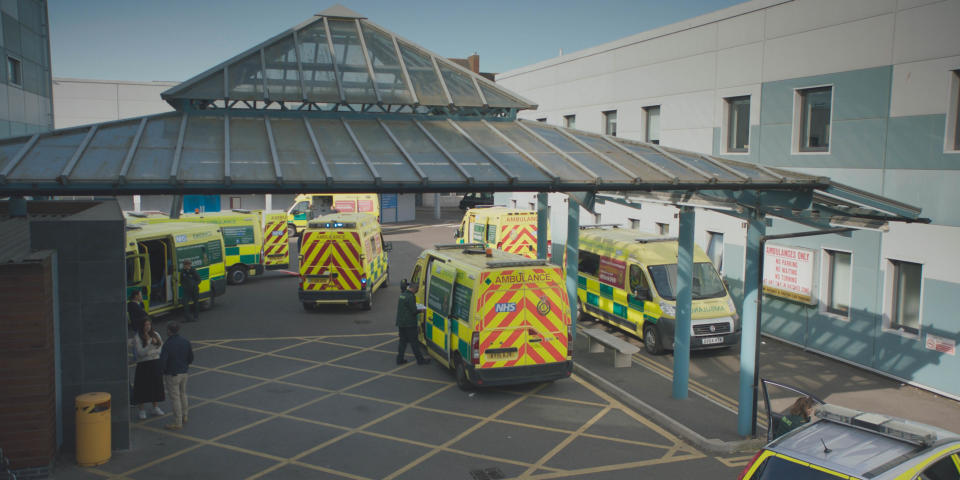 Ambulances queue up outside the hospital. (BBC)