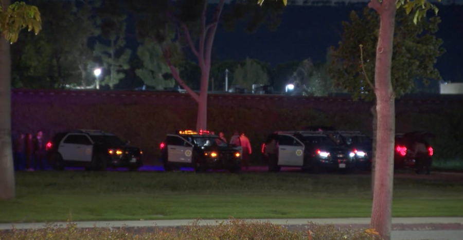 A group of deputies outside the Los Angeles County Sheriff’s Department in the city of Industry. There was a physical altercation inside the lobby, where authorities allege that a young girl stole a deputy’s gun and shot herself. The juvenile girl died at the scene on March 24, 2024. (KTLA)