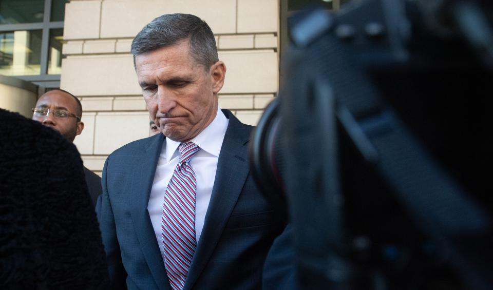 Former National Security Adviser Michael Flynn leaves U.S. District court in December 2018 after his sentencing hearing was delayed.