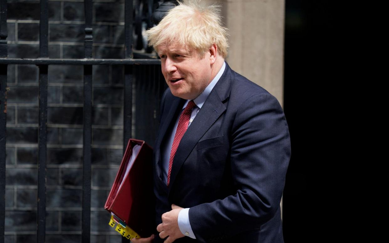 Boris Johnson attends leaves Downing Street to attend Prime Minister Questions  - Will Oliver/Shutterstock