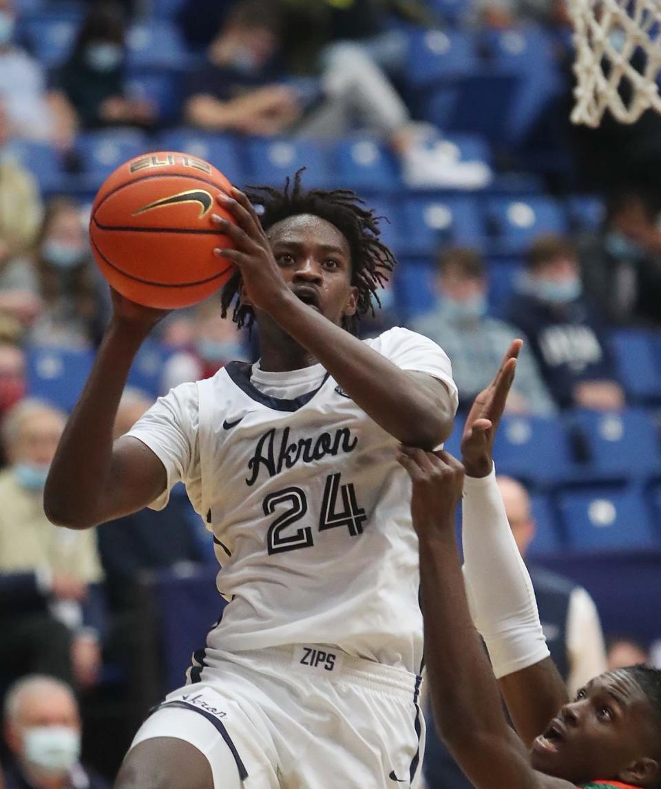 University of Akron sophomore Ali Ali goes up in the air during the first half of a game against Florida A&M on Dec. 12 at UA's Rhodes Arena on Sunday, Dec. 12, 2021. Akron won the game 73-66.