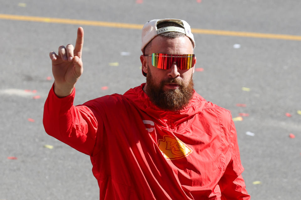 KANSAS CITY, MO - FEBRUARY 14: Travis Kelce wears a wrestling title belt while interacting with fans during the Kansas City Chiefs Super Bowl LVIII Victory Parade on Feb 14, 2024 in Kansas City, MO. (Photo by Scott Winters/Icon Sportswire via Getty Images)