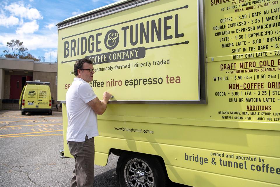 Bridge and Tunnel Coffee co-founder Greg Fulcher opens the window to one of his vehicles at A-B Tech, October 19, 2023.