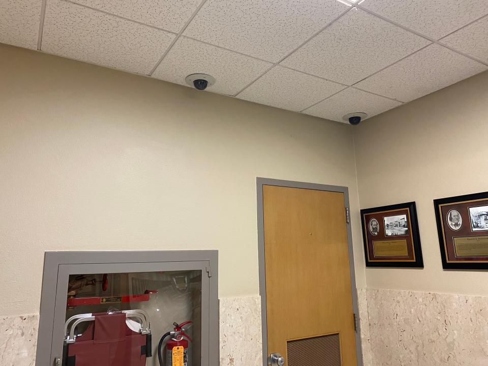 Cameras mounted in the ceiling of the second floor of Green Bay City Hall. Cameras and microphones in the building have prompted a lawsuit by people who allege that the recordings constitute "spying on" employees and citizens who visit City Hall.