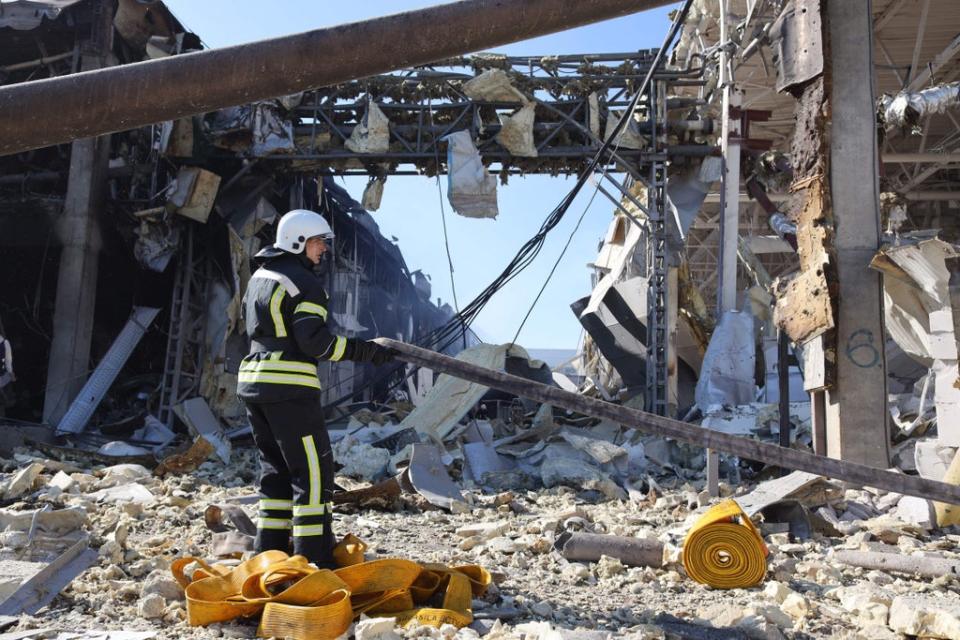First responders try to clear rubble in the hard hit Odesa region (AFP via Getty Images)