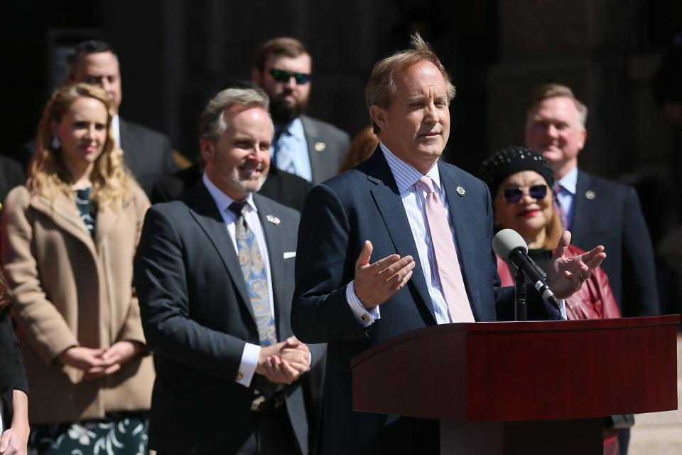 Texas Attorney General Ken Paxton, right, speaks at a pro-life leaders press conference on Feb. 28, 2022, outside the state capitol. The event was held to celebrate the six month anniversary of the Texas Heartbeat Act. Briana Sanchez, Austin American-Statesman