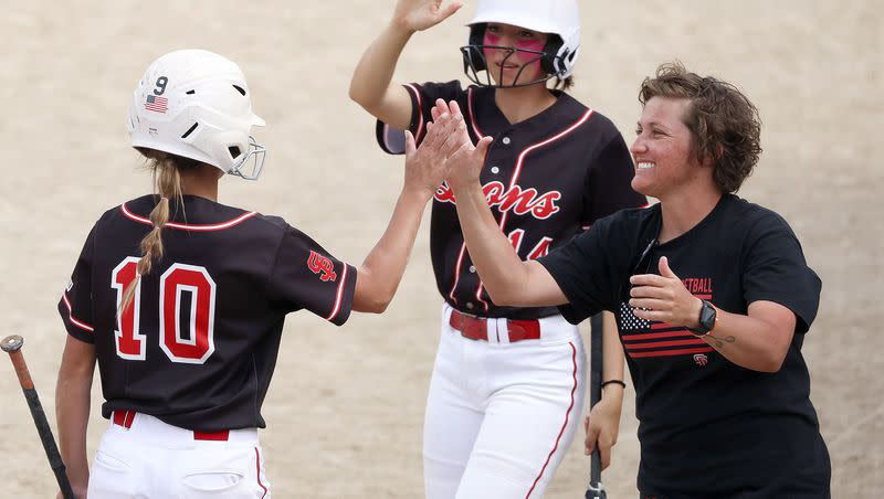 Spanish Fork celebrates a run against Bonneville in the 5A semifinal game at the Cottonwood Complex in Murray on Wednesday, May 24, 2023.