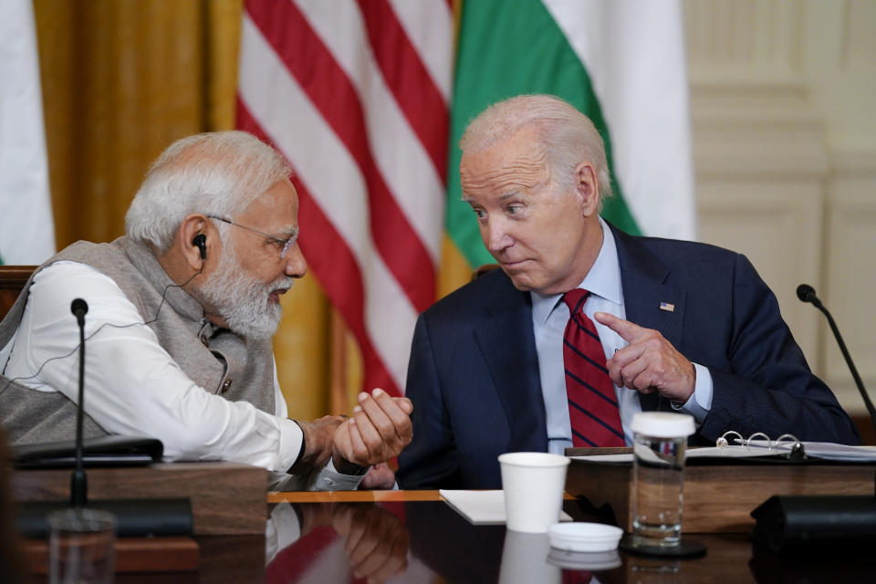 FILE - President Joe Biden speaks with India's Prime Minister Narendra Modi and American and Indian business leaders in the East Room of the White House, Friday, June 23, 2023, in Washington. On Friday, June 30, The Associated Press reported on a video clip being shared online that shows Biden talking about selling “state secrets” but omits when he made clear that he was joking. (AP Photo/Evan Vucci, File)