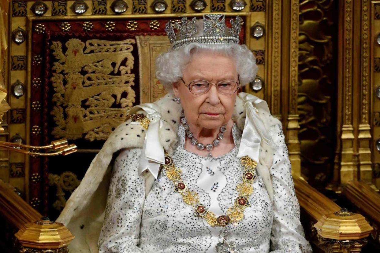 Queen Elizabeth II sits on the Sovereign's throne before delivering the Queen's Speech: POOL/AFP via Getty Images