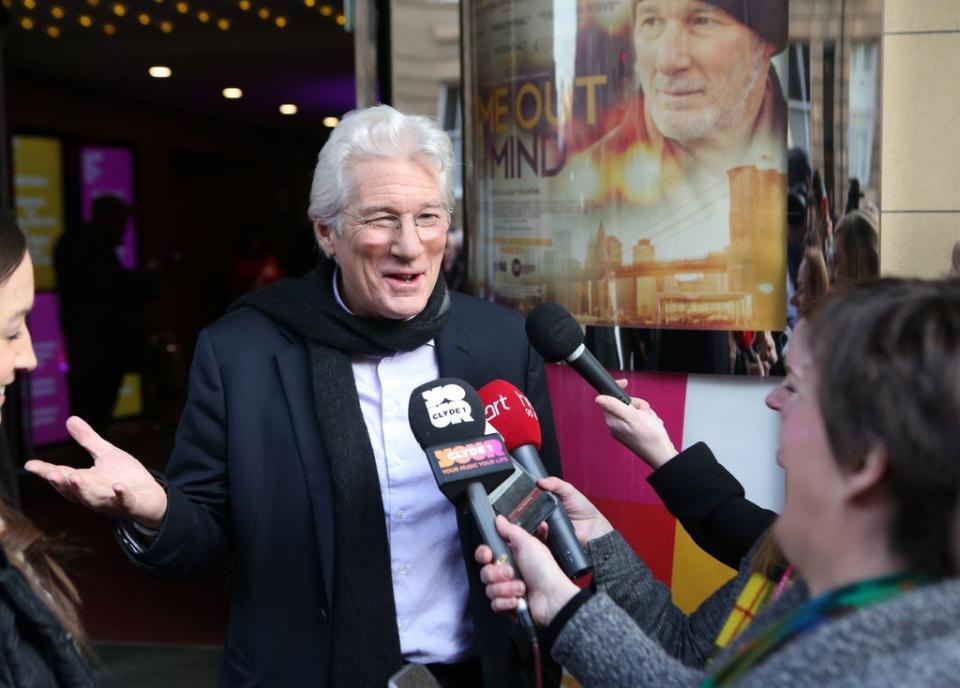 Richard Gere talks to waiting media as he attends the UK premiere of his movie, Time Out of Mind, at the Glasgow Film Theatre, as part of the Glasgow Film Festival. (Andrew Milligan/PA) (PA Archive)