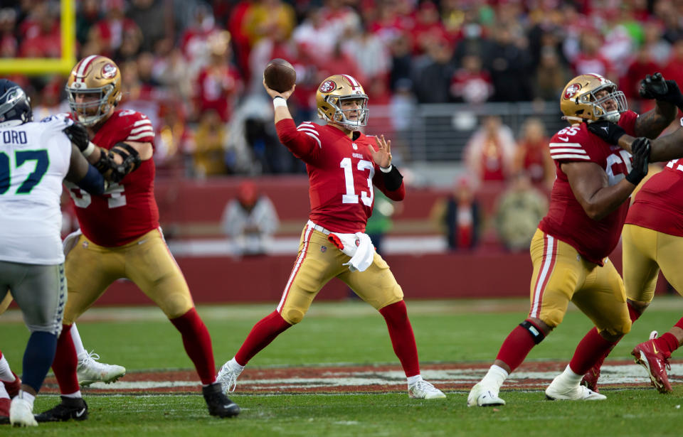 SANTA CLARA, CA - JANUARY 14: Brock Purdy #13 of the San Francisco 49ers passes against the Seattle Seahawks during the NFC Wild Card playoff game at Levi's Stadium on January 14, 2023 in Santa Clara, California. The 49ers defeated the Seahawks 41-23. (Photo by Michael Zagaris/San Francisco 49ers/Getty Images)