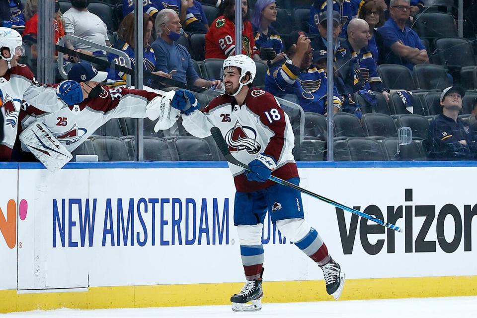 Alex Newhook #18 of the Colorado Avalanche celebrates after scoring a goal against the St. Louis Blues on Friday.