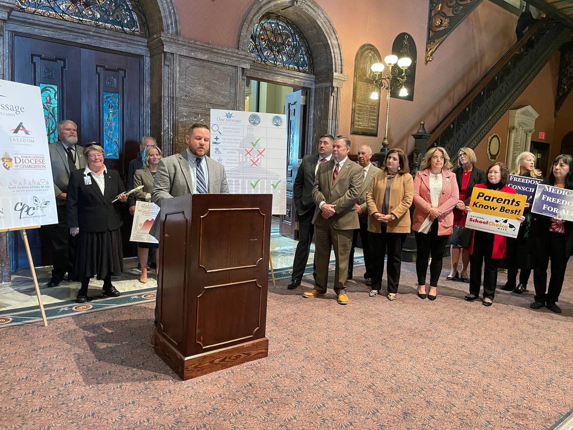 South Carolina Rep. RJ May, R-Lexington, center, speaks Wednesday, Jan. 12, 2021, at the State House in Columbia, S.C., about 2022 priorities.