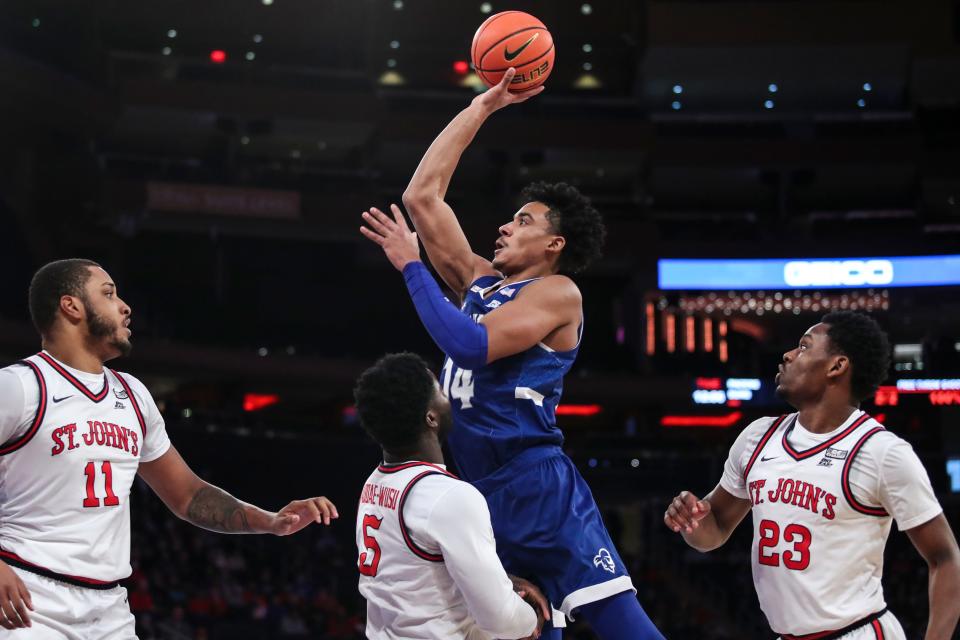 Seton Hall Pirates guard Jared Rhoden (14) takes a jump shot against the St. John's Red Storm