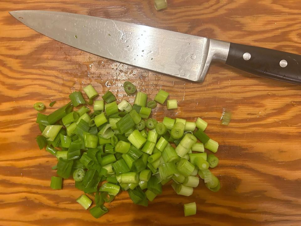 Chopped scallions for Ina Garten's Chicken Chili
