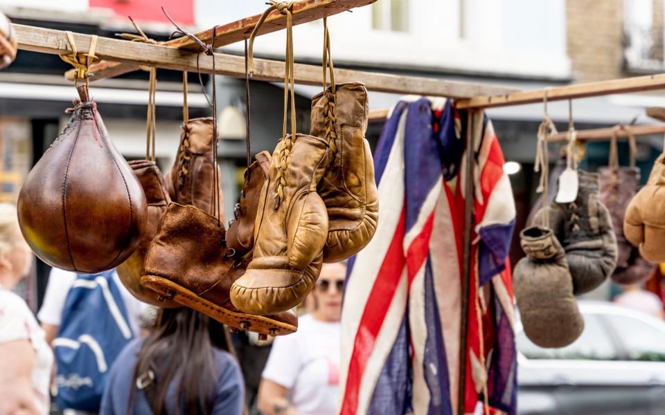 On the ropes: old boxing gear on sale at a market stall in Portobello Road, London